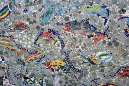 You will find several mosaics at the hatchery. The stained glass salmon mosaic, opposite the fish ladder viewing windows, was created in 2017 by 87 community members ages 4-86 years old.